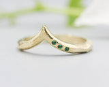 14k gold with geometric design band ring with tiny 3 emerald on the side