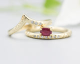 Set of 2 oval faceted ruby ring in prongs setting with diamond on 14k gold band set with 14k gold band ring with tiny 3 diamond on the side
