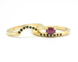 Set of 2 Oval faceted ruby ring in prongs setting with tiny black spinel on 14k gold band set with 14k gold band ring and 7 black spinel