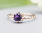 Round faceted Amethyst ring in prongs setting with 14k rose gold texture design band