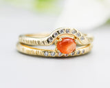 Set of 2 Oval cabochon Sunstone ring with tiny diamonds on 14k gold band set with 14k gold band ring with tiny 7 diamond on the center