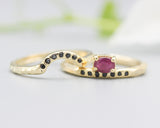 Set of 2 Oval faceted ruby ring in prongs setting with tiny black spinel on 14k gold band set with 14k gold band ring and 7 black spinel