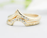 Set of 2 14k gold with line texture band ring and tiny 7 diamond on the center set with 14k gold wood texture band ring and tiny 3 diamond