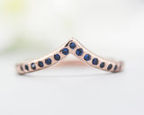 14k rose gold with hammer design texture design band ring with tiny 15 blue sapphire on the center