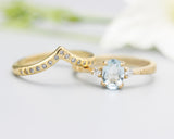 Set of 2 Oval Blue topaz ring and diamond side set in prongs setting with 14k gold band set with 14k gold band ring and tiny 15 diamond