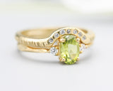 Set of 2 Oval faceted peridot ring with tiny round diamonds side set with 14k gold band ring with tiny 7 diamond on the center