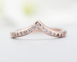 14k rose gold with line design texture design band ring with tiny 15 diamond on the center