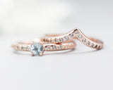 Set of 2 Round faceted blue topaz ring with tiny diamonds on 14k Rose gold band set with 14k rose gold ring with 15 diamond on the center