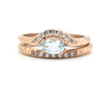 Set of 2 Oval faceted blue topaz ring with tiny diamonds on 14k Rose gold band set with 14k rose gold ring with 7 diamond on the center