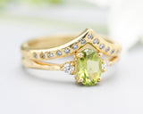 Set of 2 Oval Peridot ring and diamond side set in prongs setting with 14k gold band set with 14k gold band ring and tiny 15 diamond