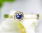 Blue sapphire ring in pave setting with 14k gold high polished flat band