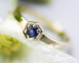 Blue sapphire ring in pave setting with 14k gold high polished flat band