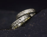 Set of his and her wedding bands ring in 18k gold in wood design texture