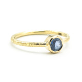 Round cut Blue sapphire ring in bezel settings with 18k gold texture band