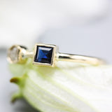 Princess cut Blue sapphire ring in bezel settings and tiny diamond with 18k gold high polished band