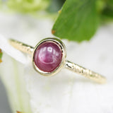 Natural star ruby ring in bezel settings with 18k gold texture band