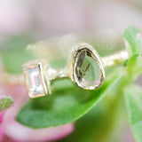 Teardrop diamond ring and rectangle diamond in bezel setting with 18k gold texture band