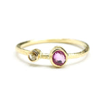 Oval ruby ring in bezel setting and tiny diamond with 18k gold texture band