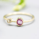 Oval ruby ring in bezel setting and tiny diamond with 18k gold texture band