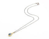 Blue star Sapphire, round diamond and Princess cut Diamond in 18k gold bezel settings with oxidized sterling silver chain