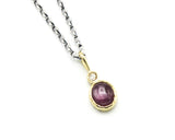 Star Ruby and round Diamond in 18k gold bezel settings with oxidized sterling silver chain