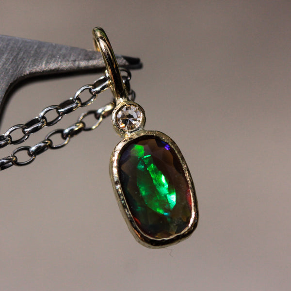 Rectangle faceted black Opal and round Diamond in 18k gold bezel settings with oxidized sterling silver chain