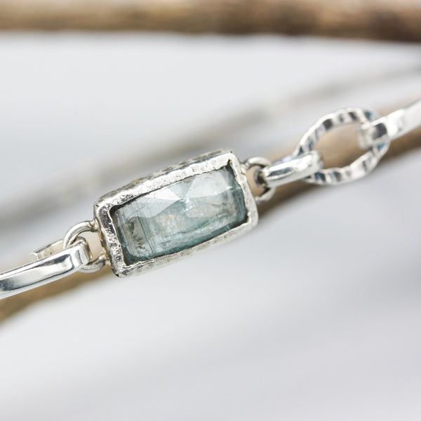 Paraiba Kyanite bangle bracelet in silver bezel setting with sterling silver high polish finished band