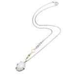 Cabochon Moonstone pendant necklace in silver bezel and prongs setting