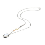 Oval moonstone pendant necklace in silver bezel and prongs setting