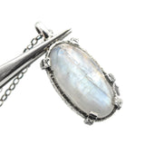 Moonstone pendant necklace in sterling silver bezel and prongs setting with sterling silver chain