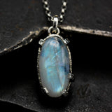 Moonstone pendant necklace in sterling silver bezel and prongs setting with sterling silver chain