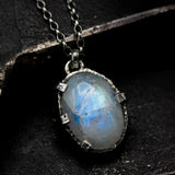 Cabochon Moonstone pendant necklace in silver bezel and prongs setting