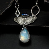 Teardrop Moonstone pendant necklace with silver leaf and oval tiny blue kyanite secondary