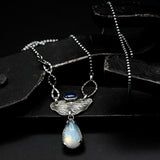 Teardrop Moonstone pendant necklace with silver leaf and oval tiny blue kyanite secondary