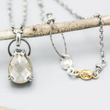 Teardrop Rutilated quartz necklace in silver bezel and prongs setting sterling silver chain