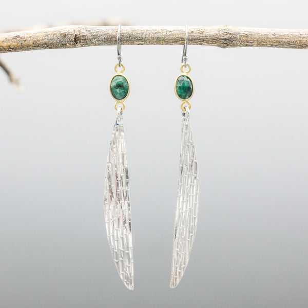 Oval Emerald earrings in bezel setting with silver leaf on oxidized sterling silver hooks style