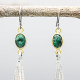 Oval Emerald earrings in bezel setting with silver leaf on oxidized sterling silver hooks style