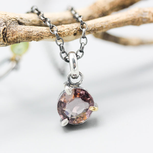 Elegant champagne spinel pendant necklace features a precision sterling silver bezel and prong setting