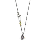 Sophisticated grey spinel pendant features a precision crafted sterling silver bezel and prong setting