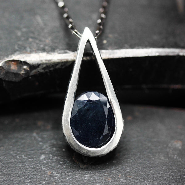 Silver teardrop pendant with blue sapphire gemstone set with sterling silver chain necklace