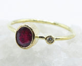 Oval Faceted Red Stone Ring in 18k Gold with Clear Accent — product view 5