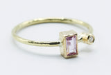 Rectangular pink stone ring in 18k gold with clear accent — view 3