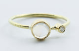 Round Opalescent Stone Ring in 18k Gold with Clear Accent — product view 1