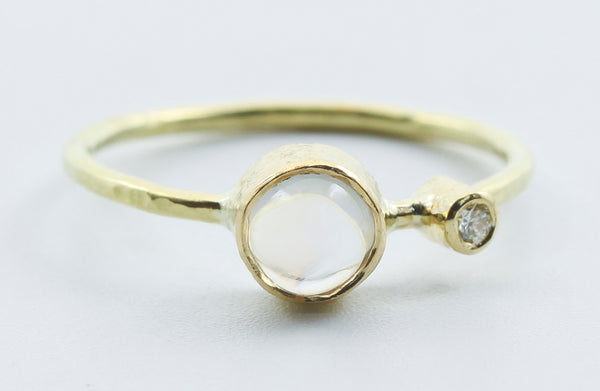 Round Opalescent Stone Ring in 18k Gold with Clear Accent — product view 1