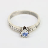 Oval faceted moonstone in prongs setting with sterling silver square texture band - Metal Studio Jewelry