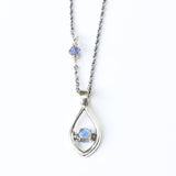 Silver leaf shape necklace and labradorite at the center with iolite beads secondary on oxidized sterling silver chain - Metal Studio Jewelry