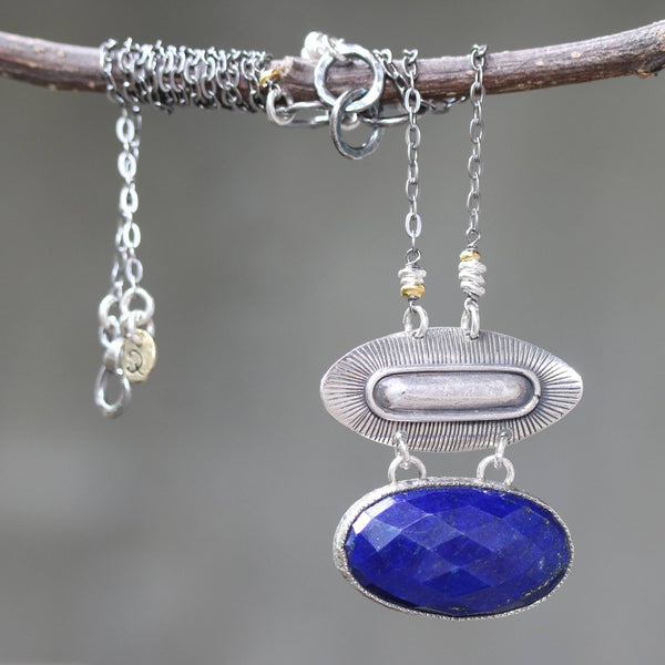 Oval faceted Lapis pendant necklace in silver bezel setting with oval silver engraving textured on sterling silver oxidized chain - Metal Studio Jewelry