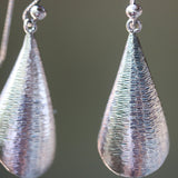 Silver leaf shape earrings with textured on oxidized sterling silver hooks style - Metal Studio Jewelry