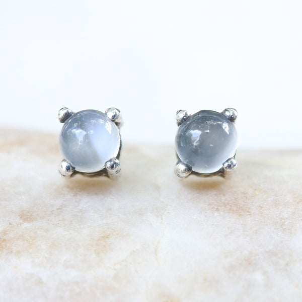 Sterling silver stud earrings with cabochon white moonstone in prongs setting with sterling silver post and backing - Metal Studio Jewelry