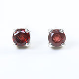 Sterling silver stud earrings with faceted garnet in prongs setting with sterling silver post and backing - Metal Studio Jewelry